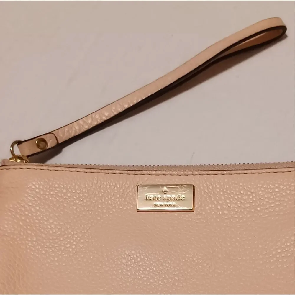 Kate Spade New York Pink Tone Wristlet.